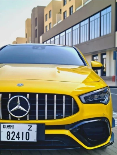 Mercedes Benz CLA45  2023 YELLOW RENTAL IN DUBAI - undefined